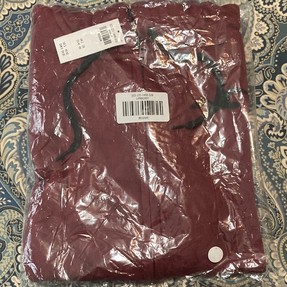 Maroon zip up Hollister jacket never worn still in package